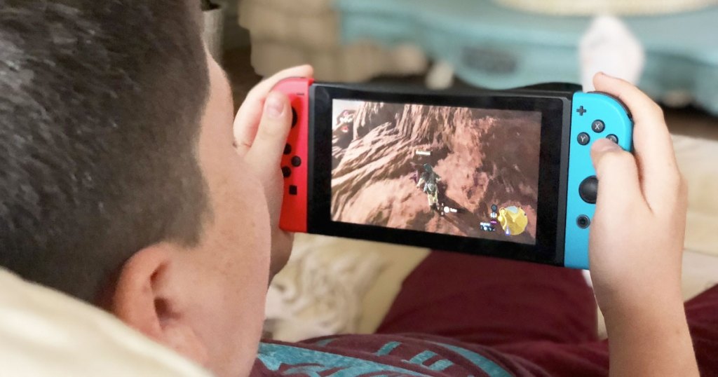 boy playing Fortnite on Nintendo Switch