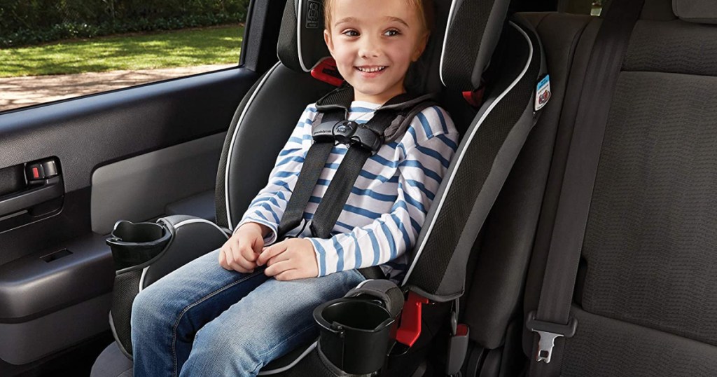 girl in car seat in car