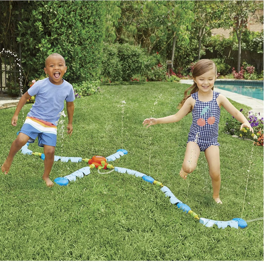 Kids playing in Little Tikes Sprinkler