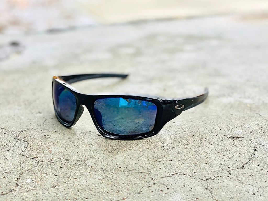 Oakley sunglasses on cement