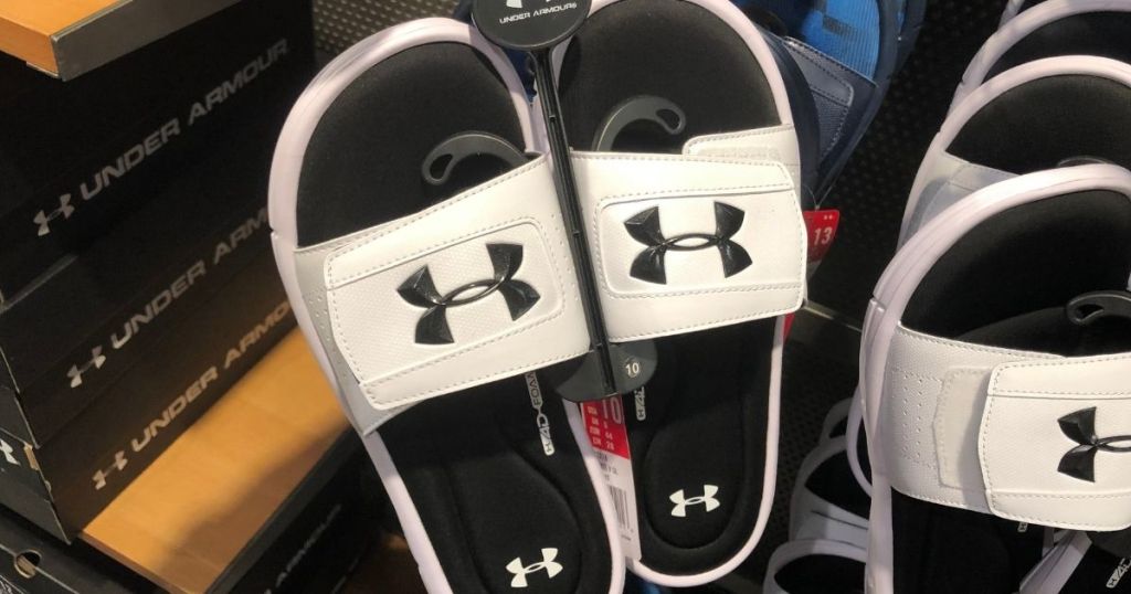 pair of Under Armour kids slides