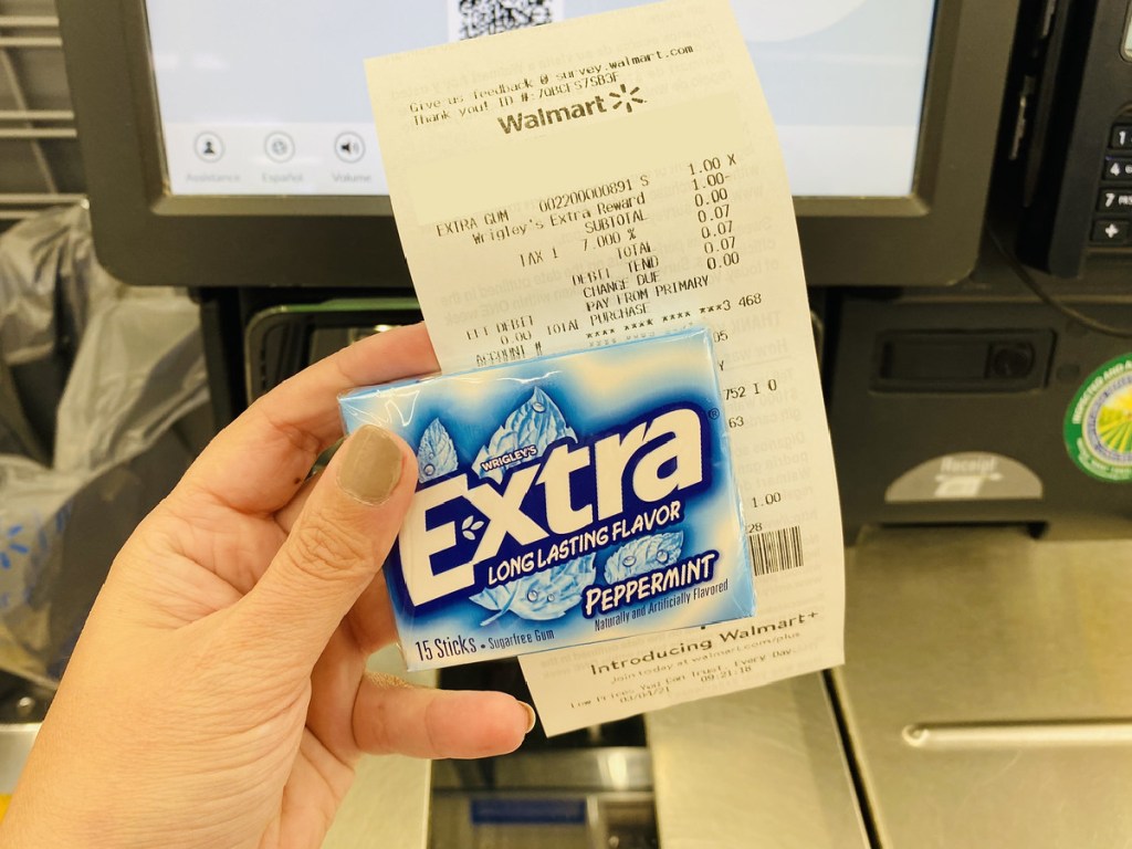 extra peppermint gum with receipt in hand