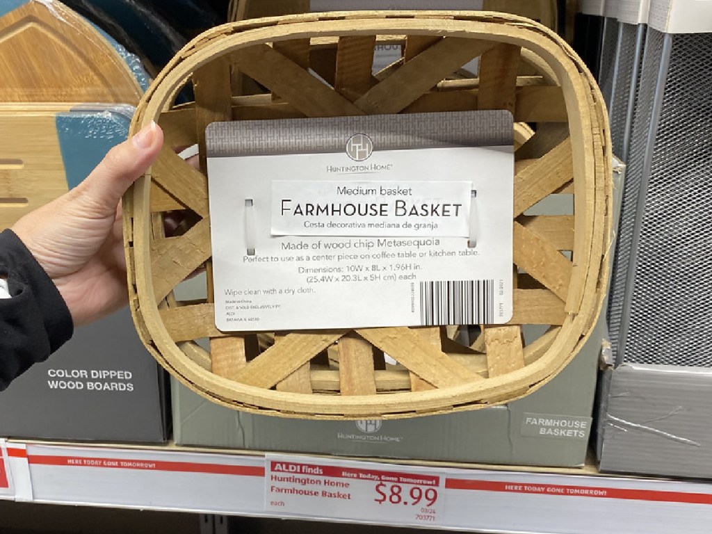 hand holding decorative basket inside store