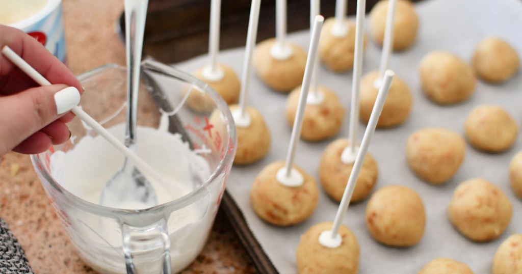 placing balls on a cookie sheet pan