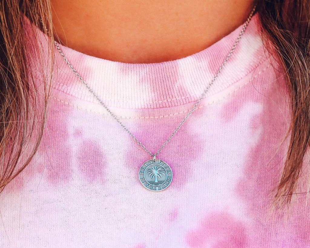 pura vida necklace on tie dye shirt