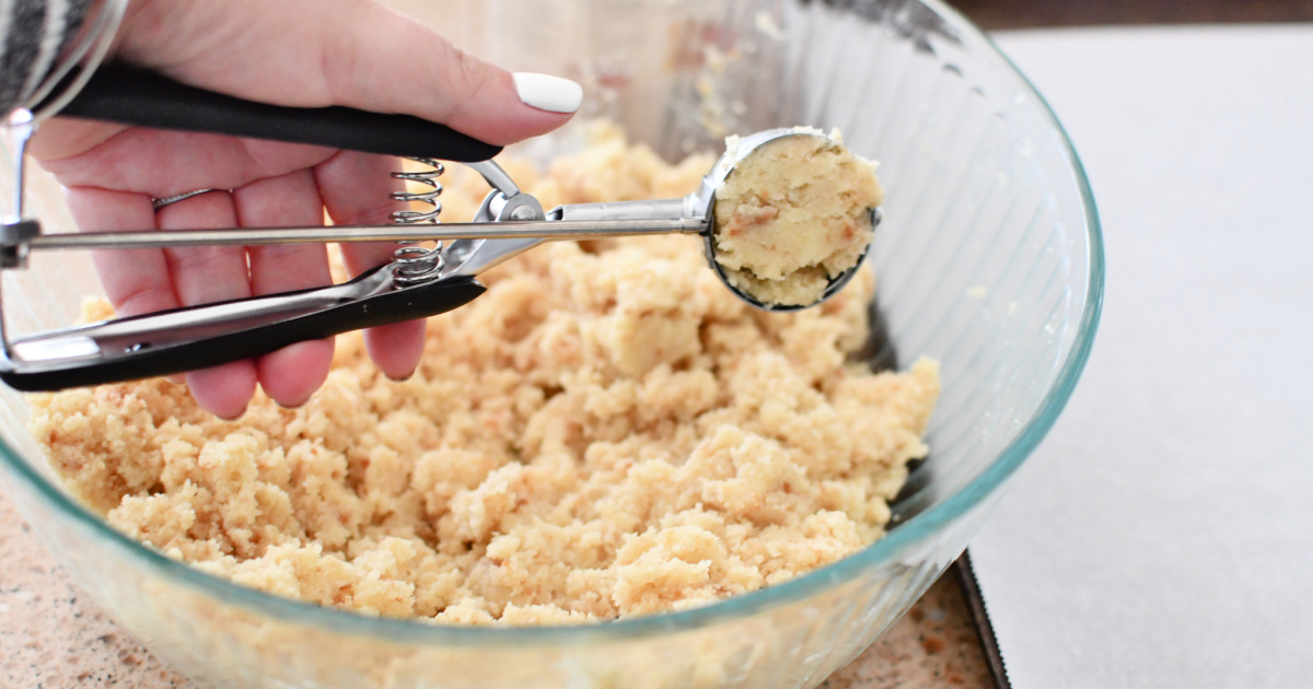 using a cookie roller to make cake balls