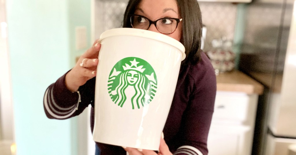 woman drinking large starbucks drink