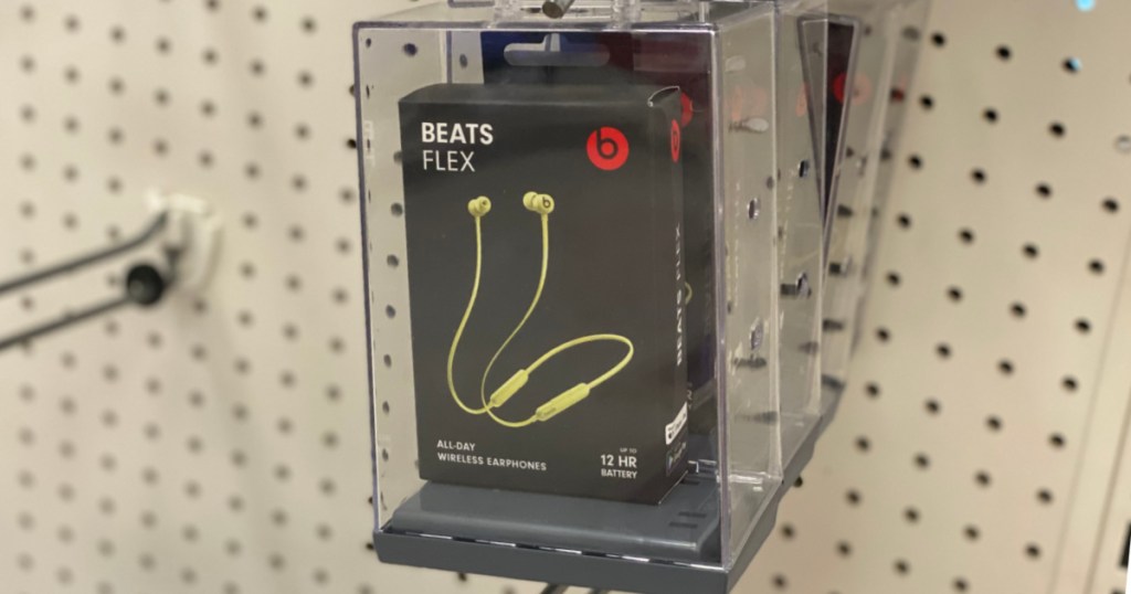 black earbuds on shelf 