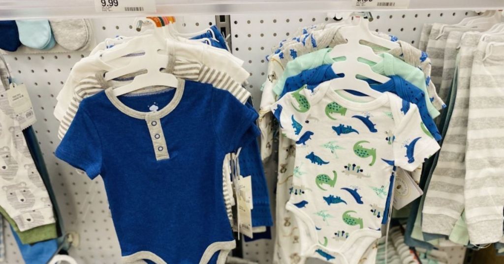 baby boy onsies on hanger 