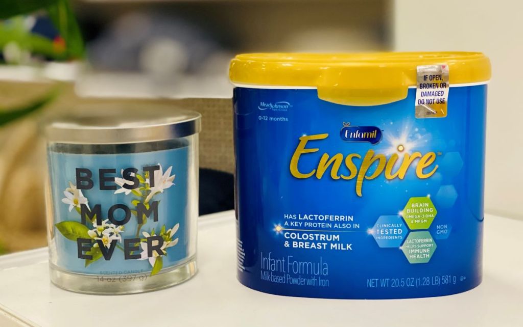 Enfamil Enspire formula by a candle