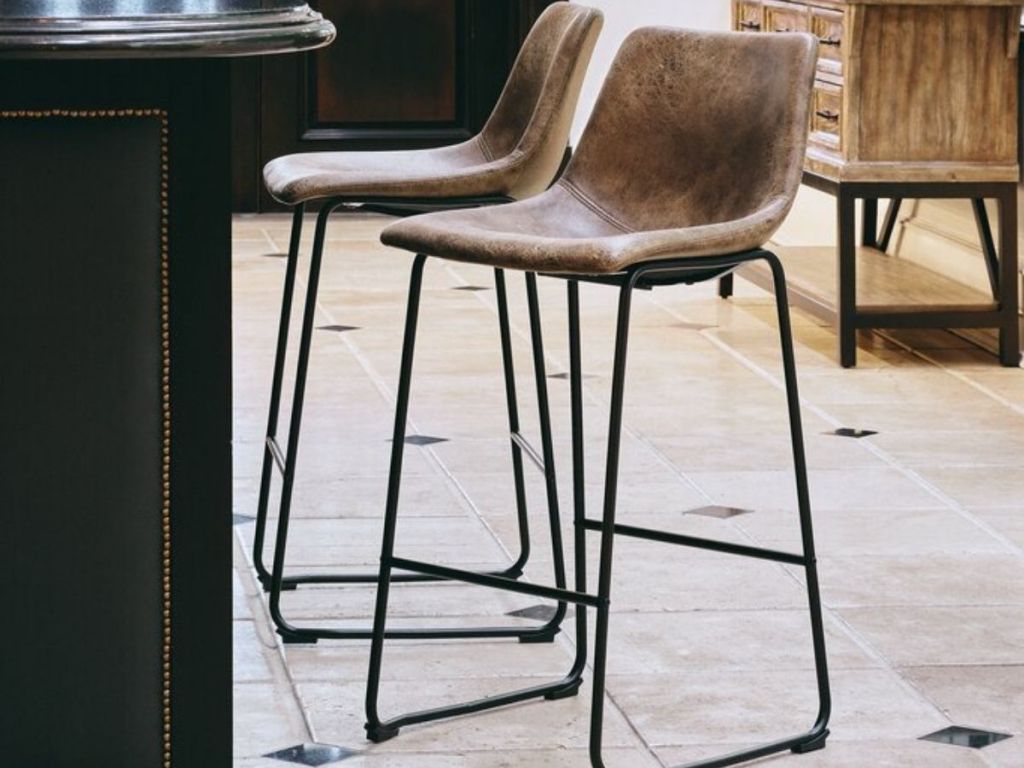 Erika brown stools in a home in front of a countertop