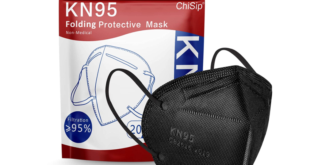 KN95 Black Mask next to packaging