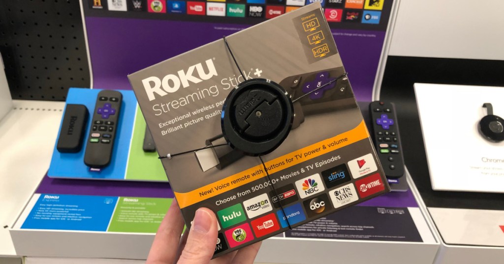 hand holding roku streaming device