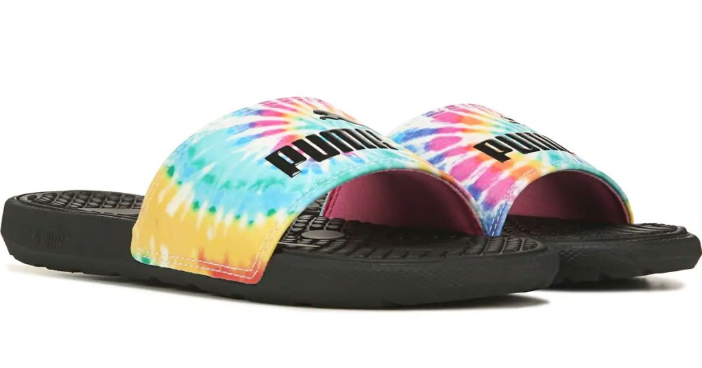 pair of tie dye puma slides