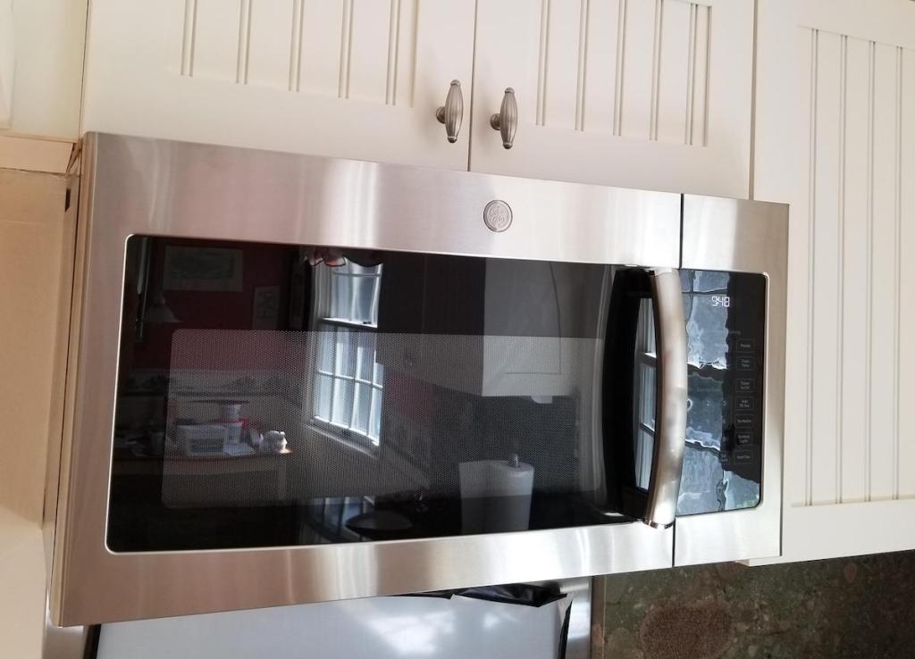 stainless steel microwave above stove top