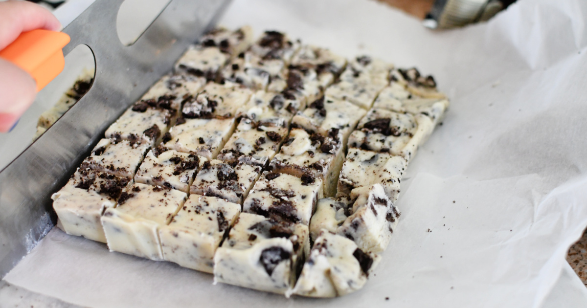 cutting up oreo for easy microwave fudge recipe