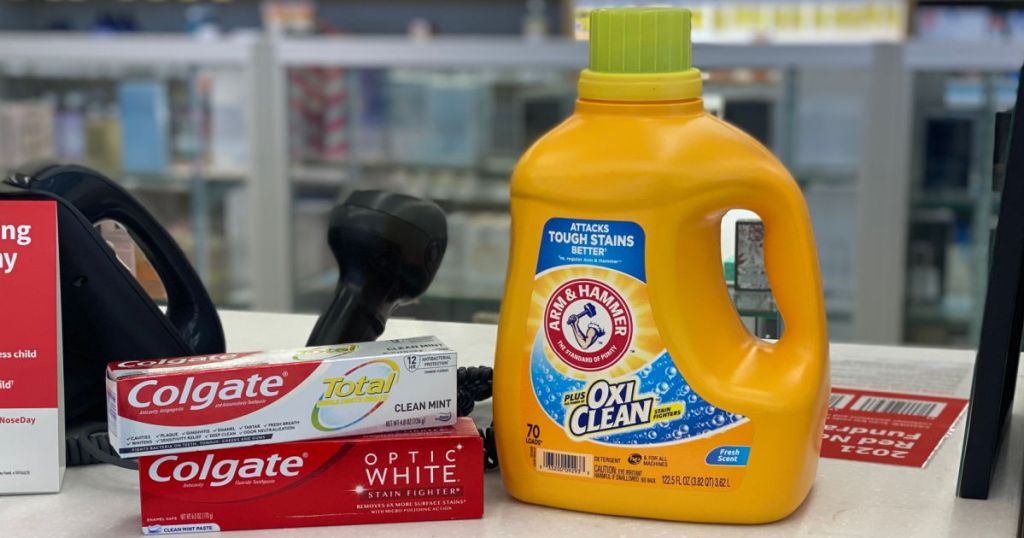 toothpaste and laundry detergent on shelf