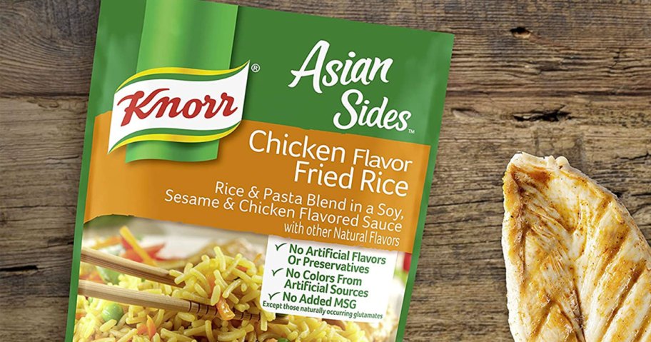 package of knorr rice side next to chicken breast