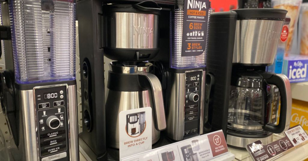 black coffee maker on shelf 