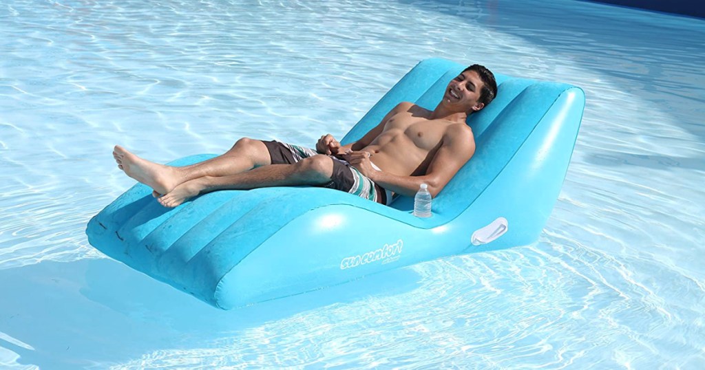 boy lounging in the pool