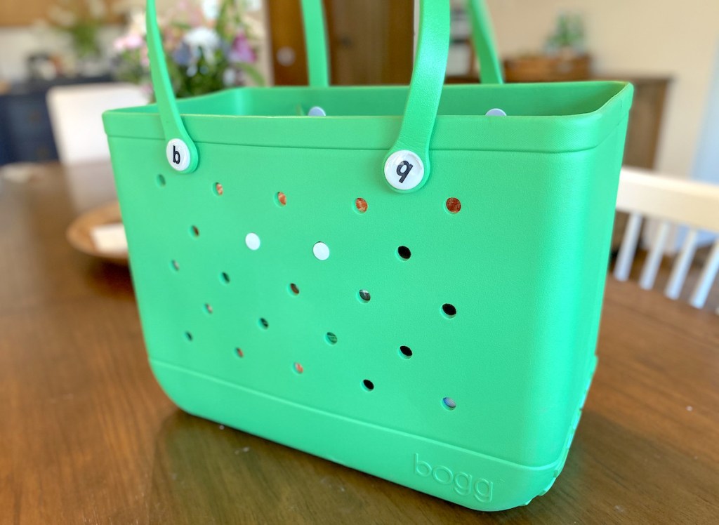 bright green bogg bag on table