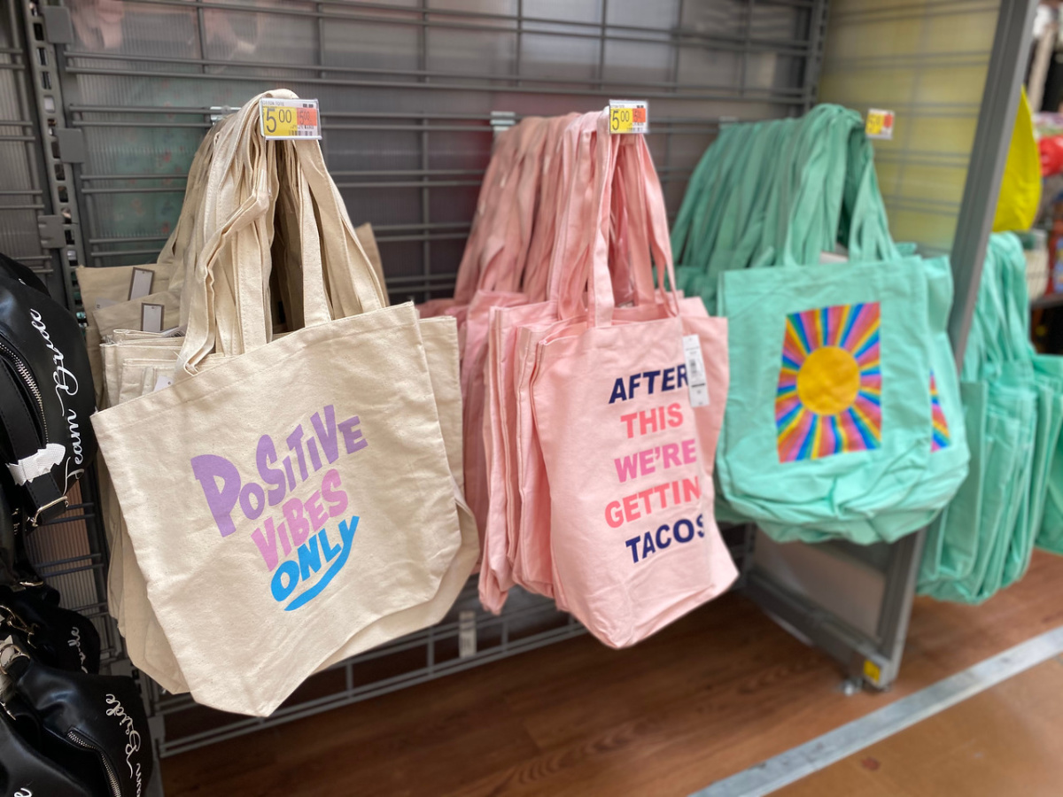 three bags hanging in store on display