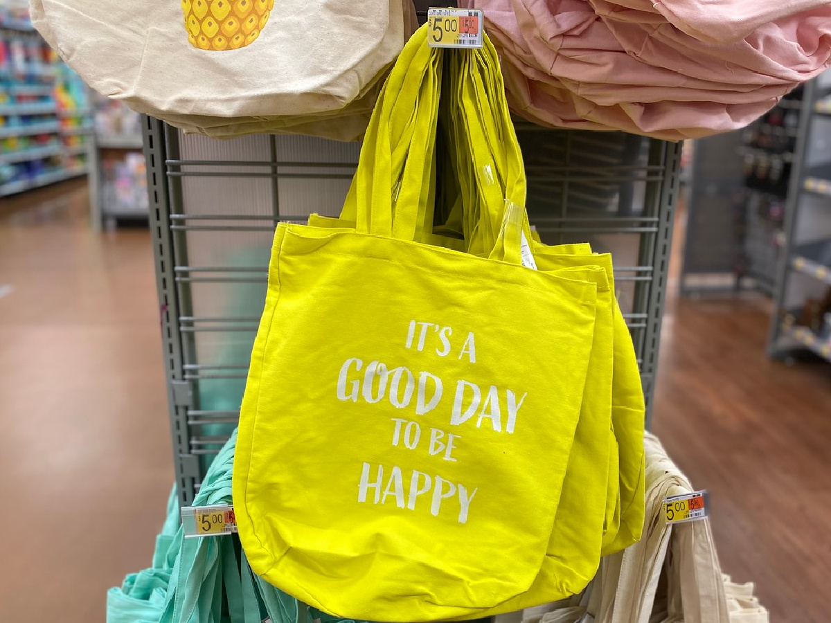 yello tote hanging in store on display