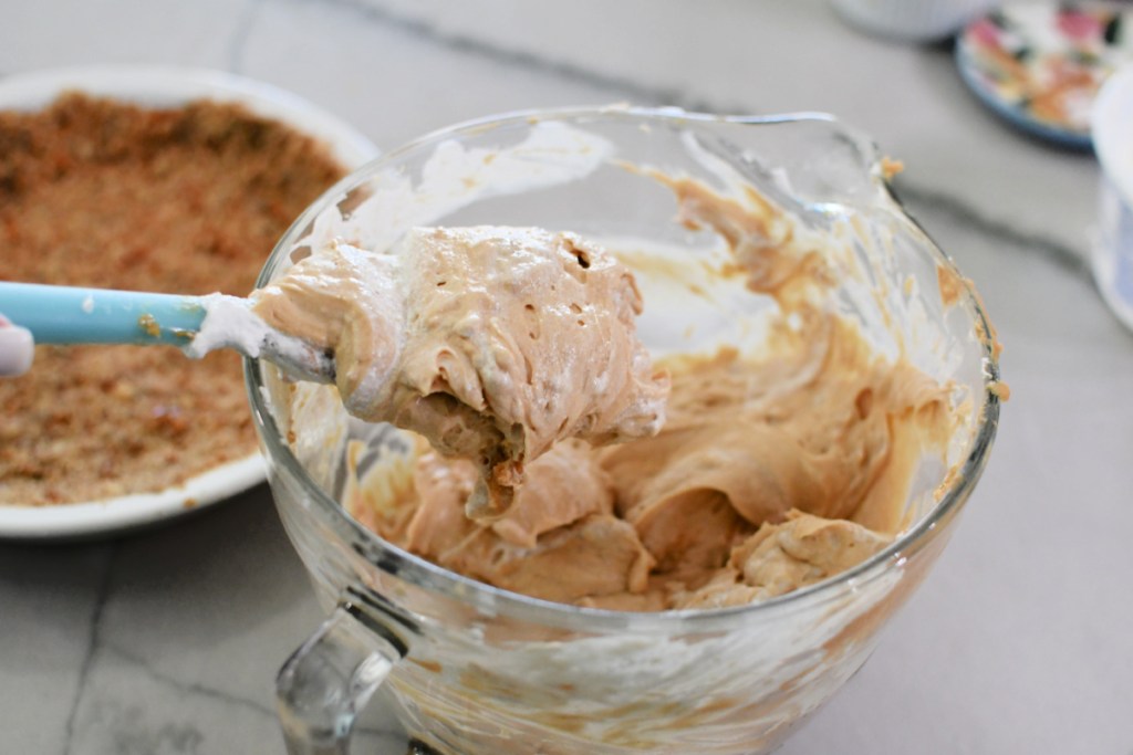 mixing pie filling in a batter bowl