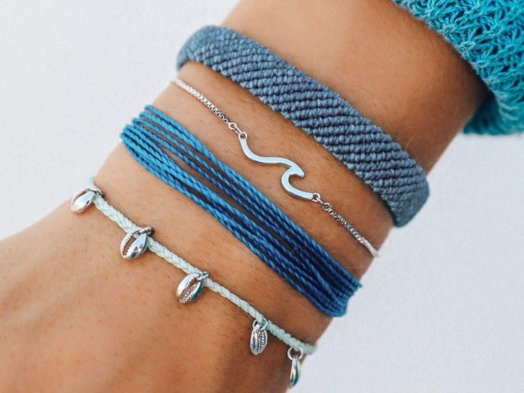 pura vida bracelets on wrist