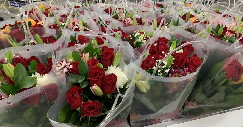 bags with rose vase arrangement