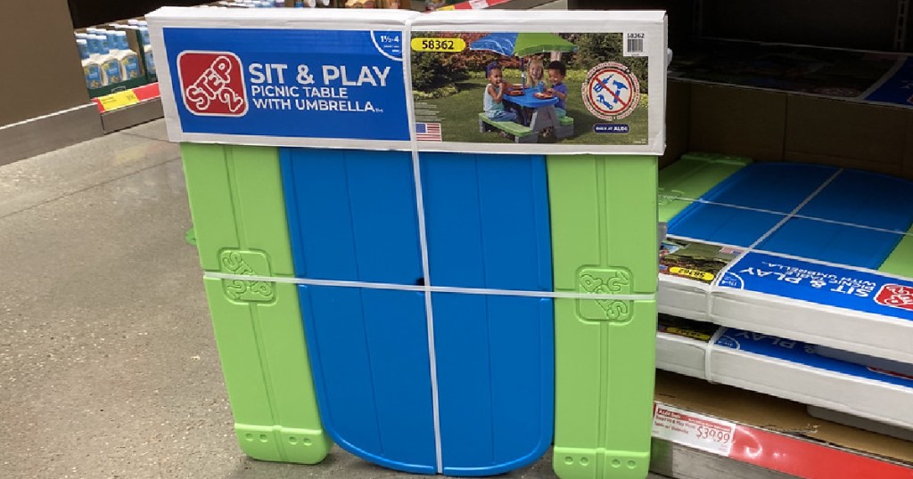 kids blue and green plastic picnic table in box in store