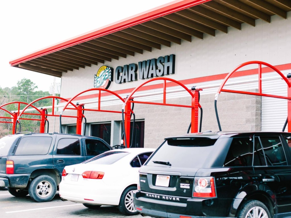 cars parked outside Zips car wash