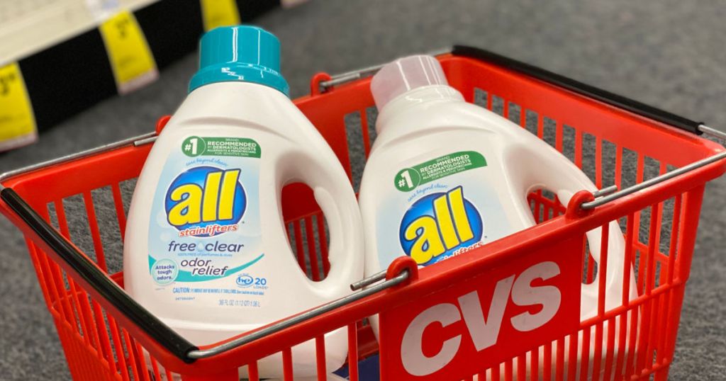 two white bottles of detergent in red basket 