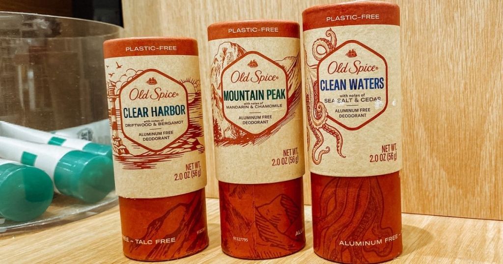 three tubes of Old Spice deodorant