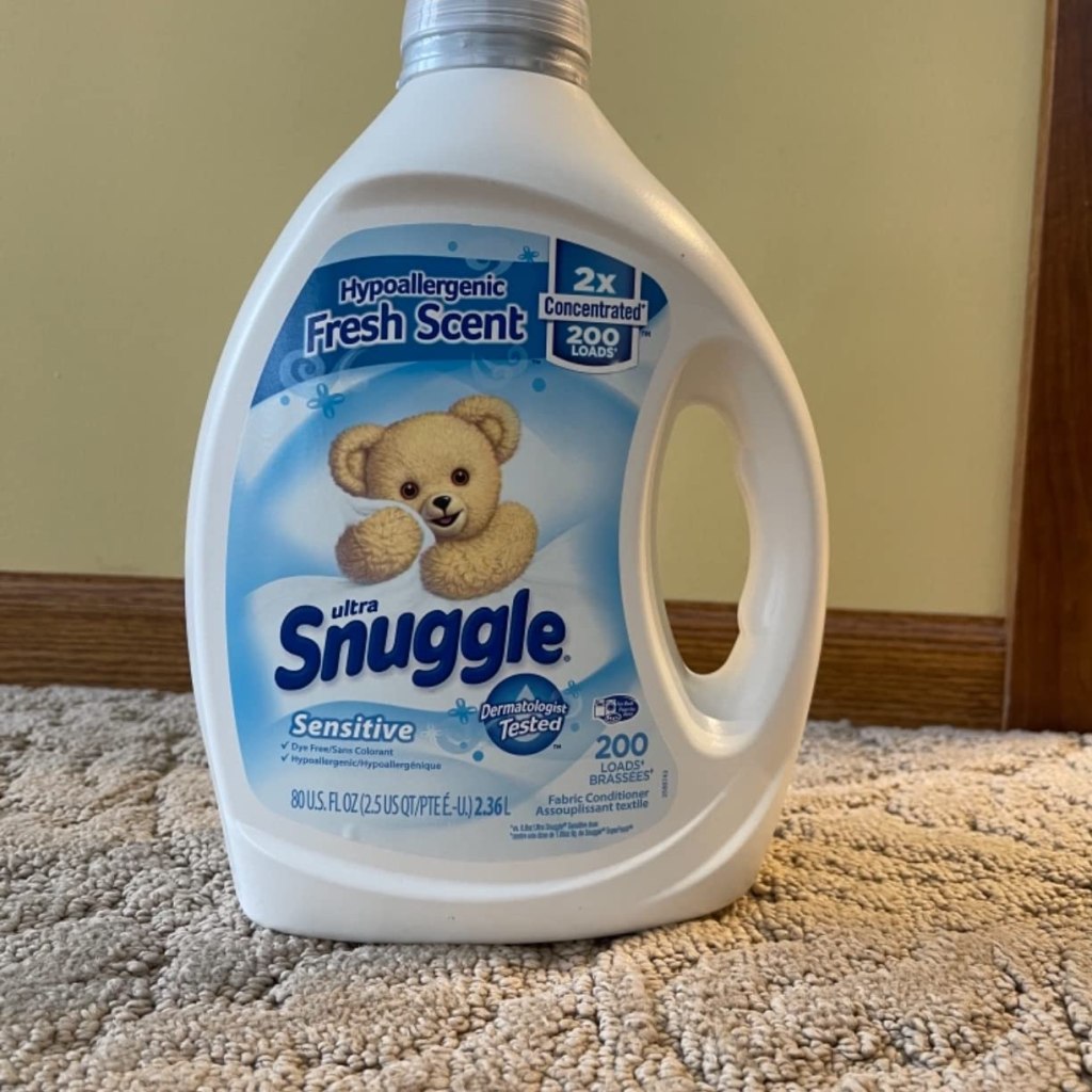 Snuggle Sensitive Fabric Softener on rug