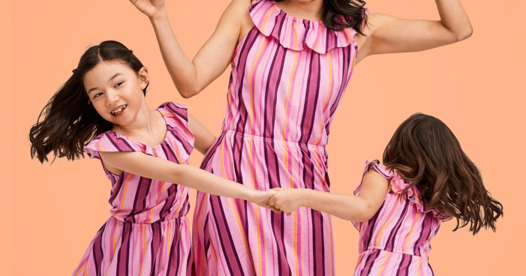 woman and children wearing matching dresses