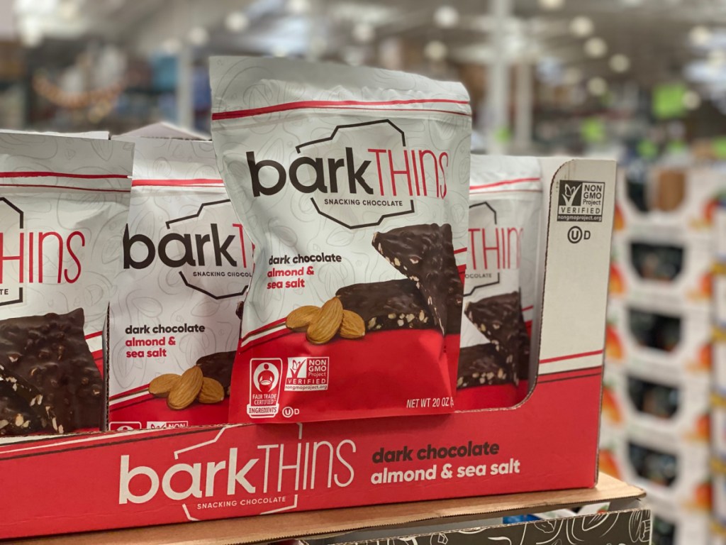 store display with bags of snacking chocolate