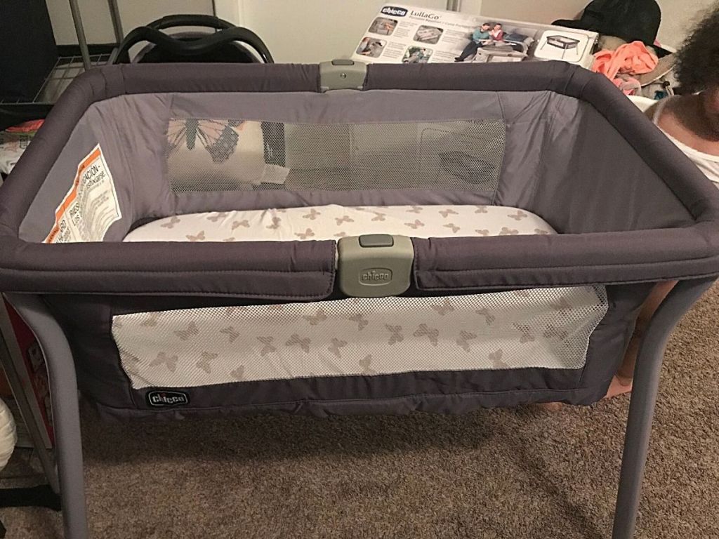 purple Chicco portable bassinet