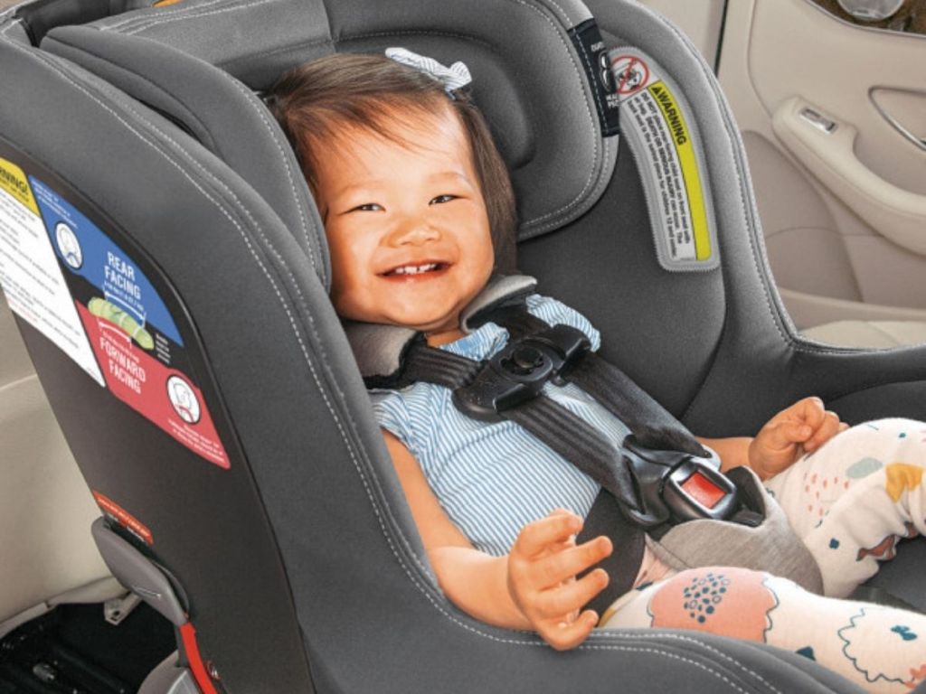 baby in Chicco carseat