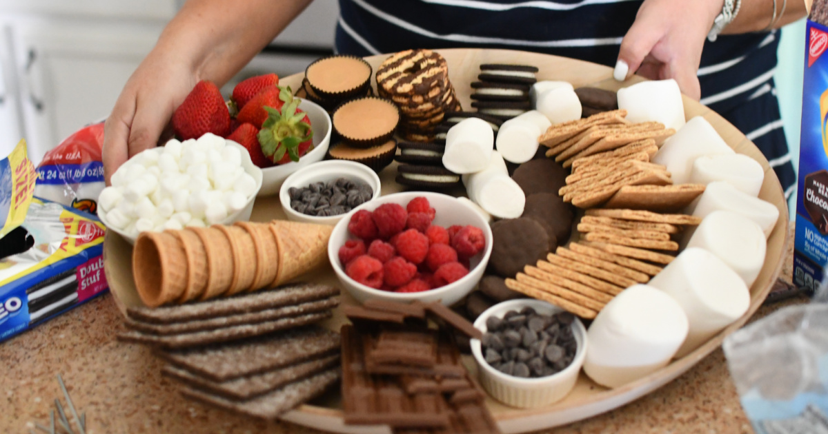 assorted marshmallows, chocolate, and cookies on a platter 