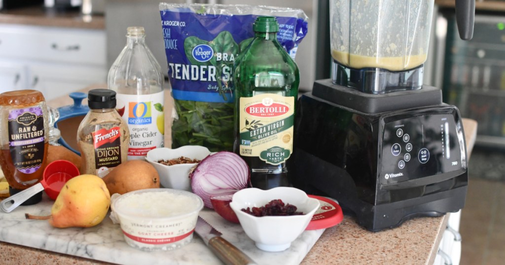 pear spinach salad ingredients on the counter