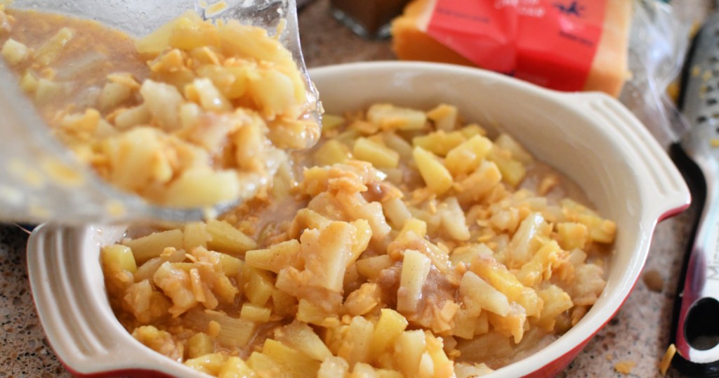 pouring pineapple into casserole dish