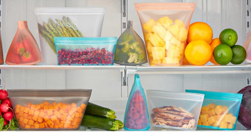 containers with food inside fridge 