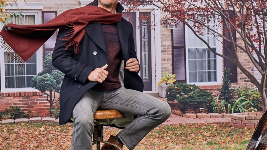 man siting on a chair outside