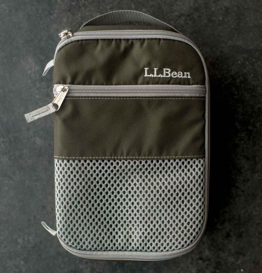 dark green ll bean lunch box on gray background