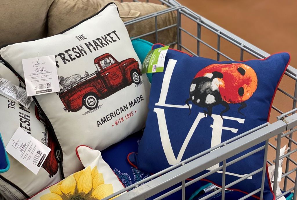 bin full of outdoor pillows at Walmart