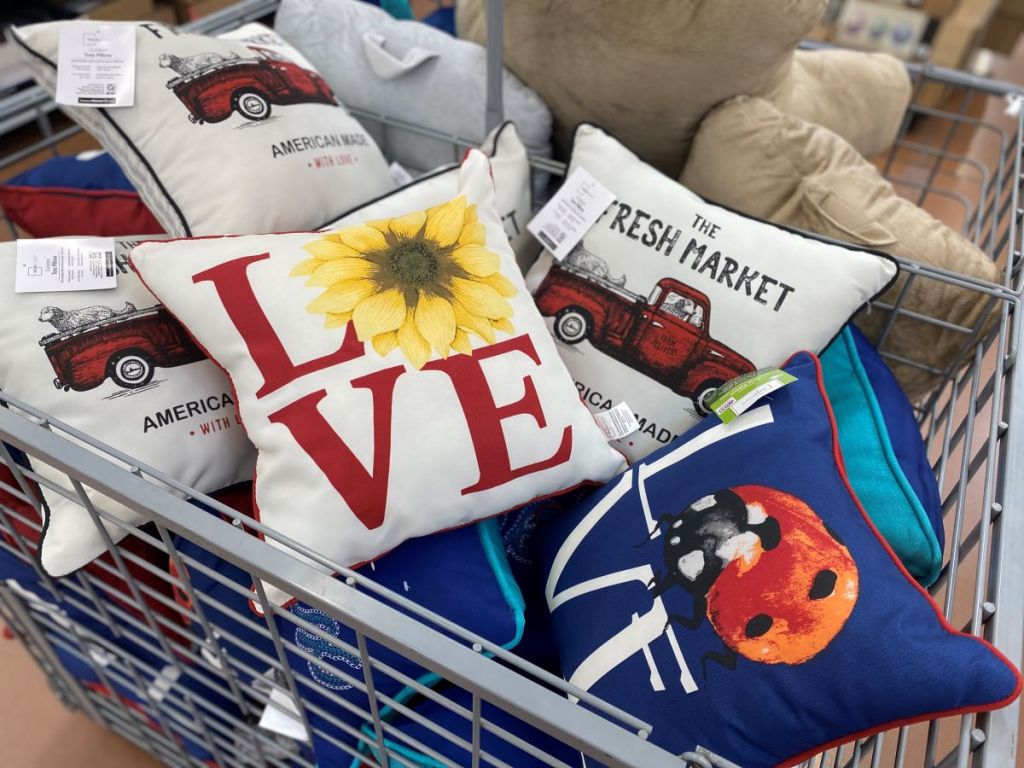 bin of outdoor pillows at Walmart