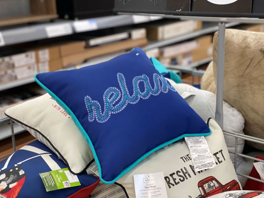 outdoor pillow that says relax