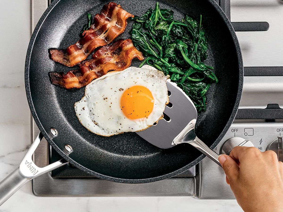 cooking breakfast in fry pan