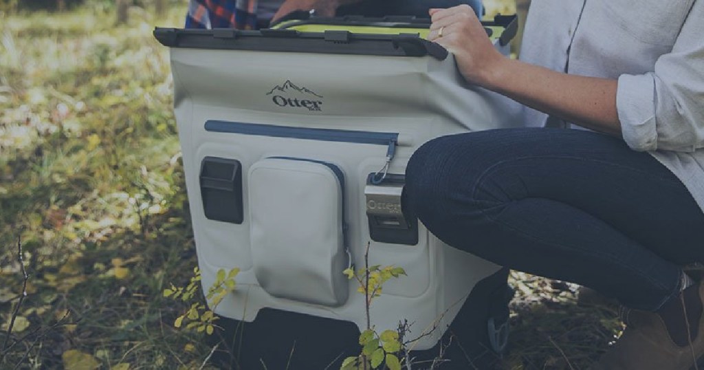 Gray OtterBox Cooler on forest floor